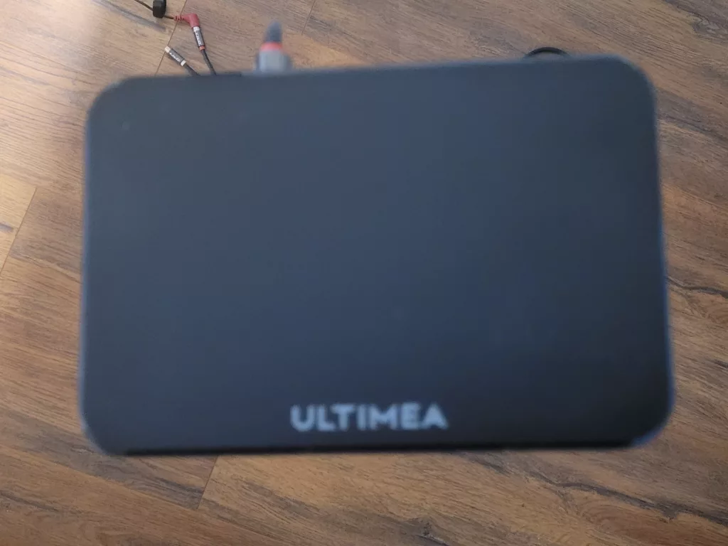 The Ultimea D60 5.1 Surround Sound Rear Speaker Attached to the Bluetooth Subwoofer in the Ultimea Poseidon D60 review