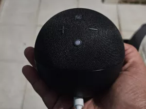 Amazon Echo Dot (5th Gen) held in hand to illustrate its compact size and portability - ​Amazon Echo Dot 5th Gen features​
