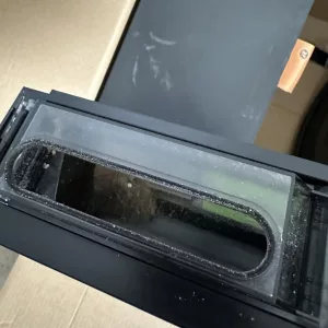 Close-up of the Roomba Combo j5 Plus dustbin showing collected debris. - Roomba Combo j5 Plus design features​
